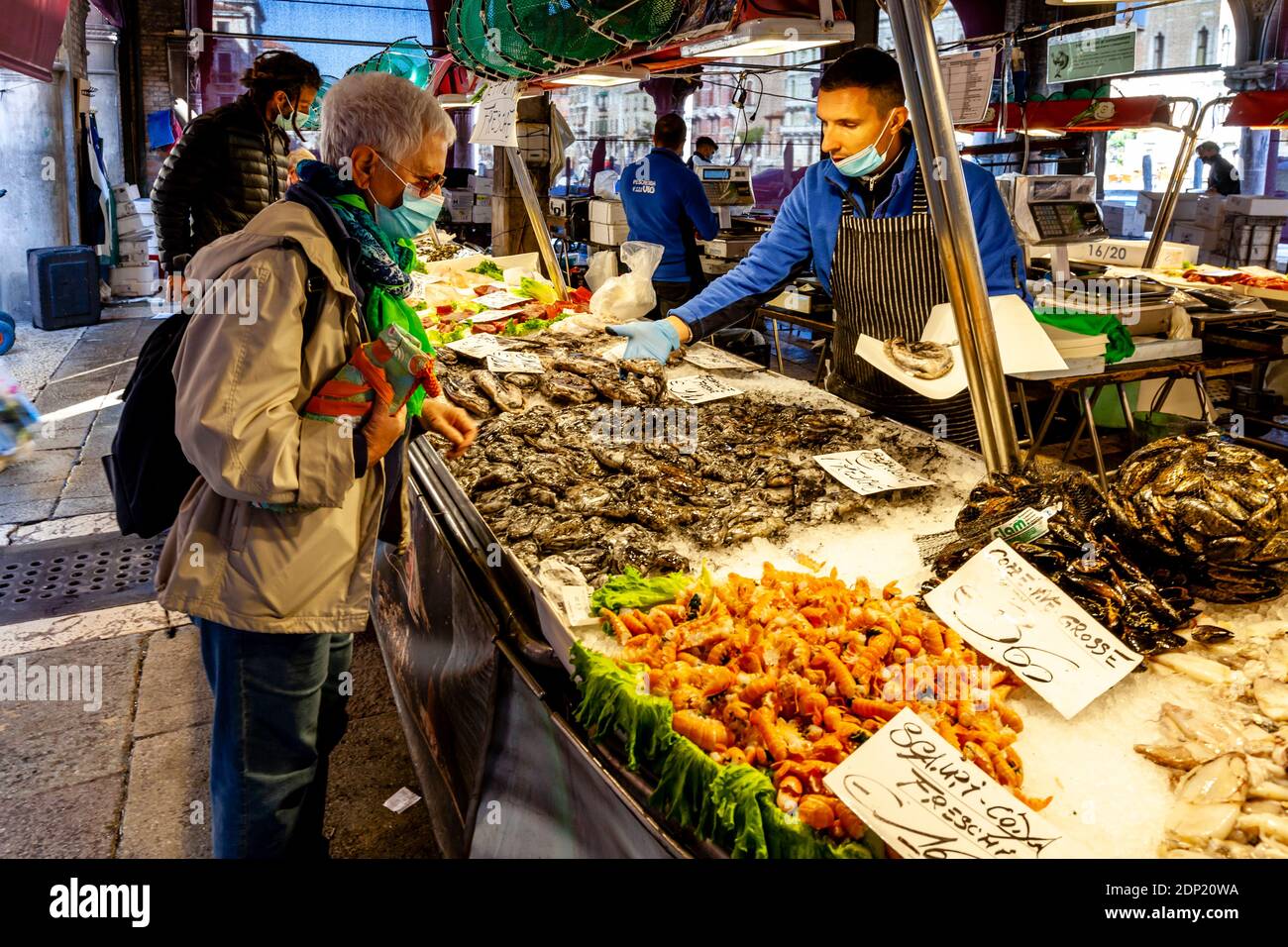 Local People Buying Fresh Seafood From The Fish Market, Venice, Italy