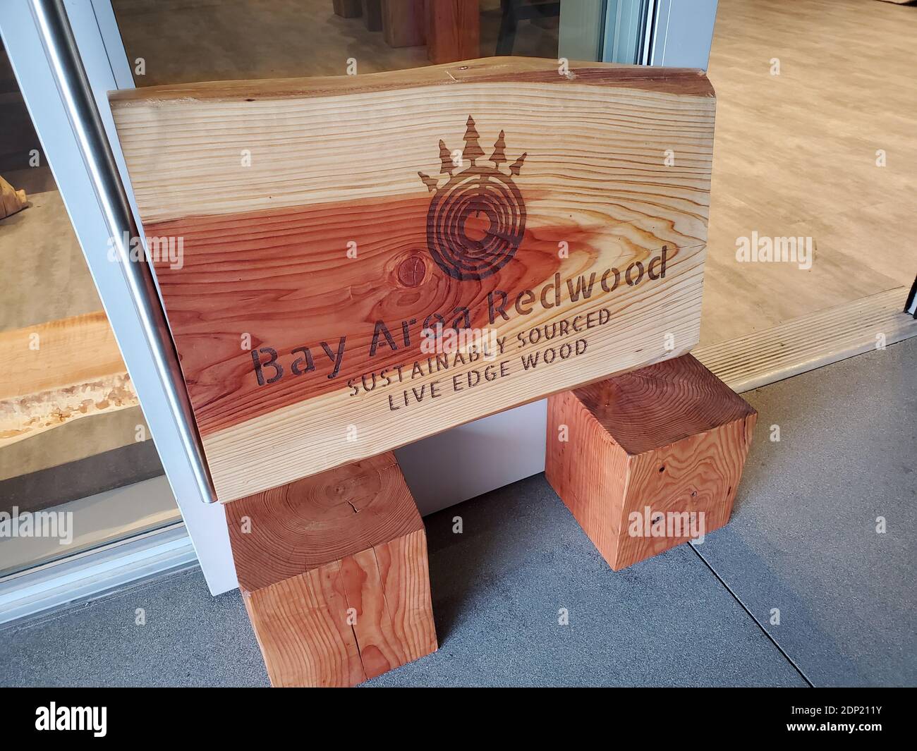 Close-up shot of a wooden sign featuring the logo for the Bay Area Redwood furniture store in San Ramon, California, December 5, 2020. () Stock Photo