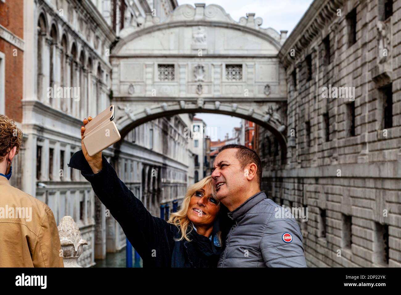 Visitors Taking Selfies At The Bridge Of Sighs (Ponte Dei Sospiri), Venice, Italy. Stock Photo