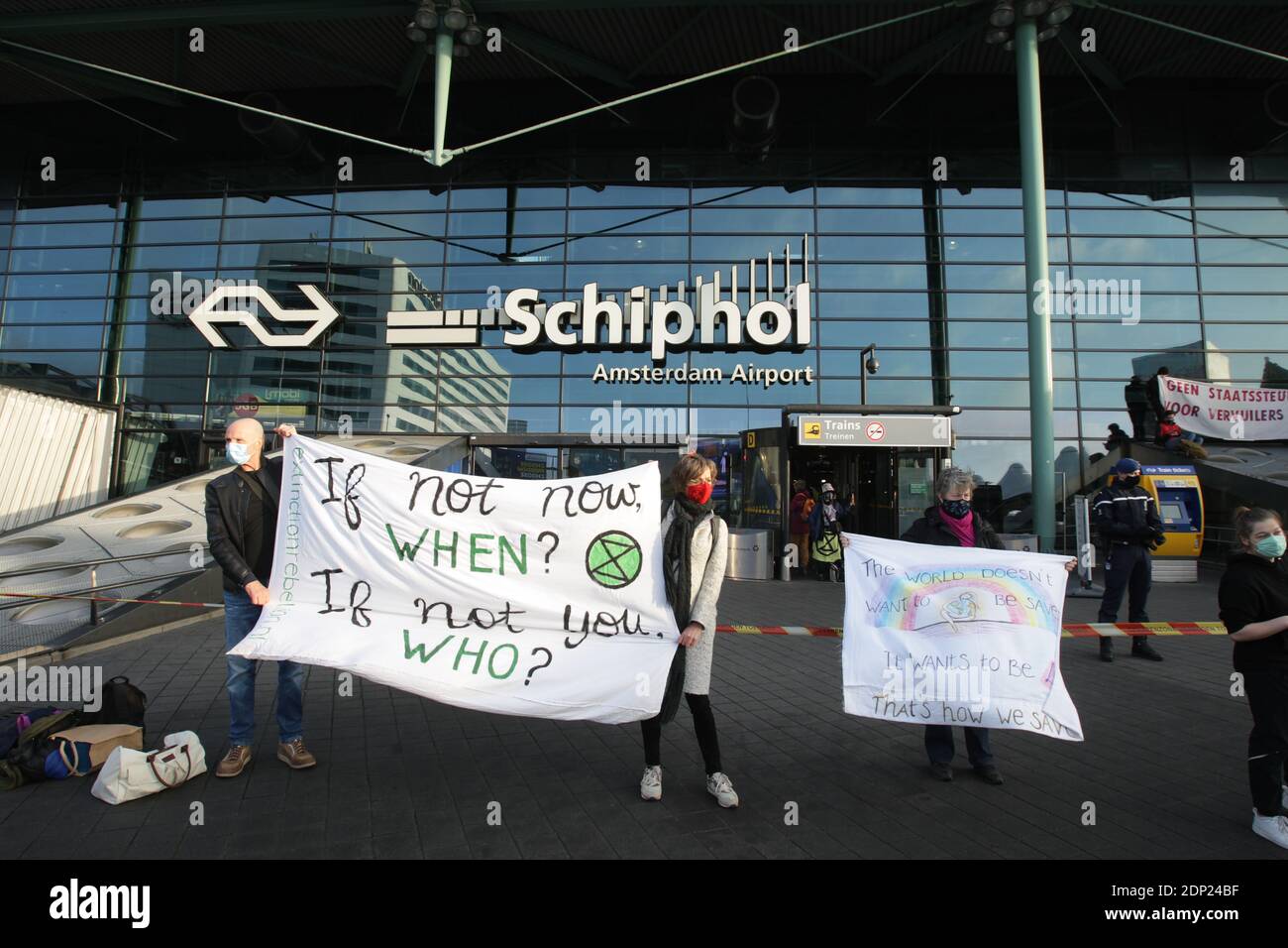 Extinction Rebellion environmental activist  protest blocks the terminals access of the Amsterdam’s Schiphol Airport amid the coronavirus pandemic on Stock Photo