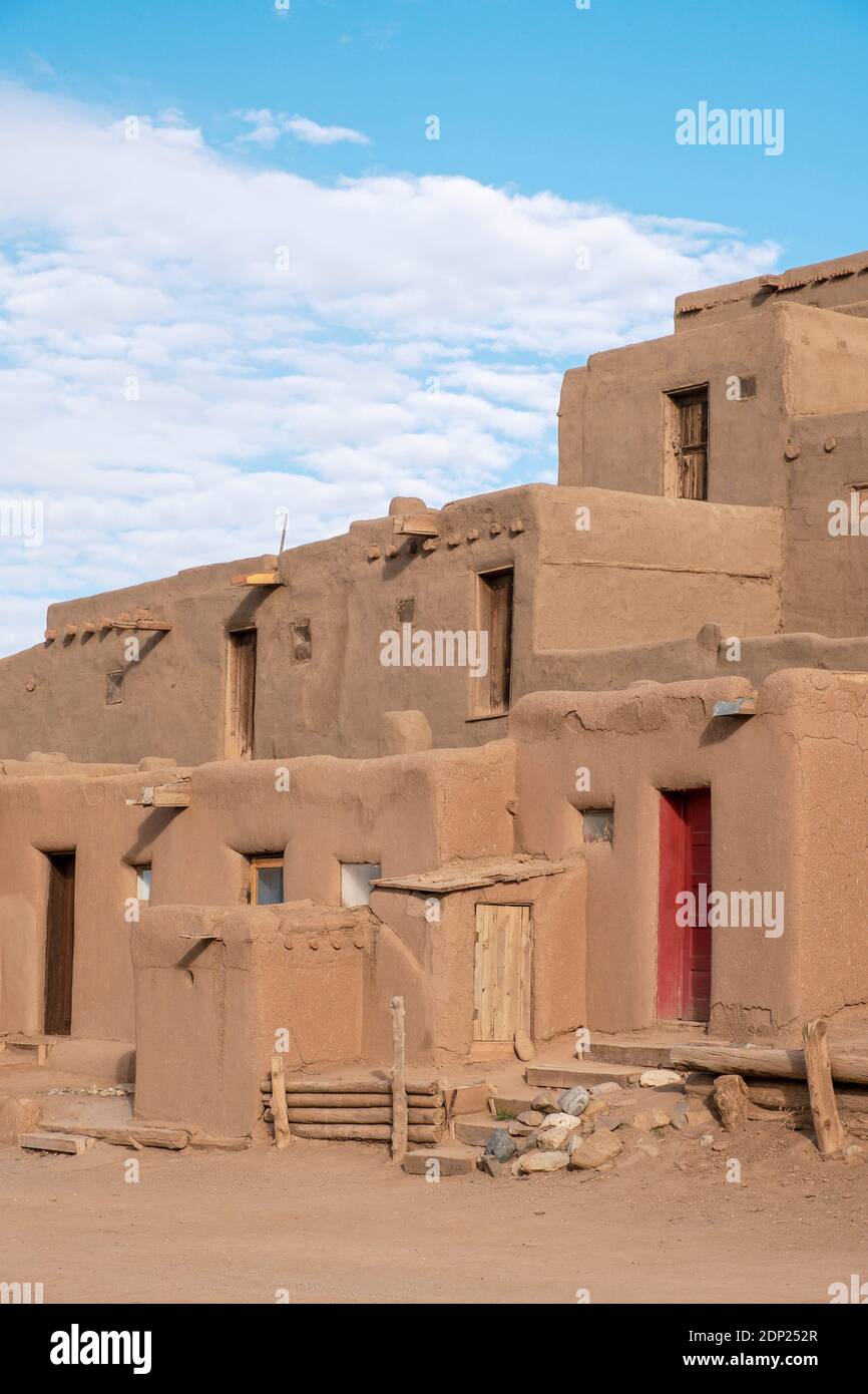 Adobe mud brick houses in the historical Native American village of Taos Pueblo, New Mexico, USA. A UNESCO World Heritage Site. Stock Photo