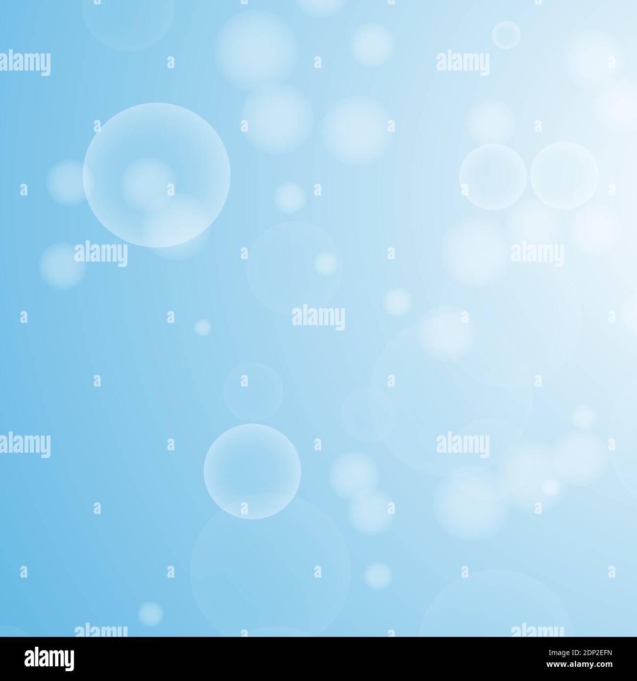 Light blue abstract background with a bokeh in the form of circles ...
