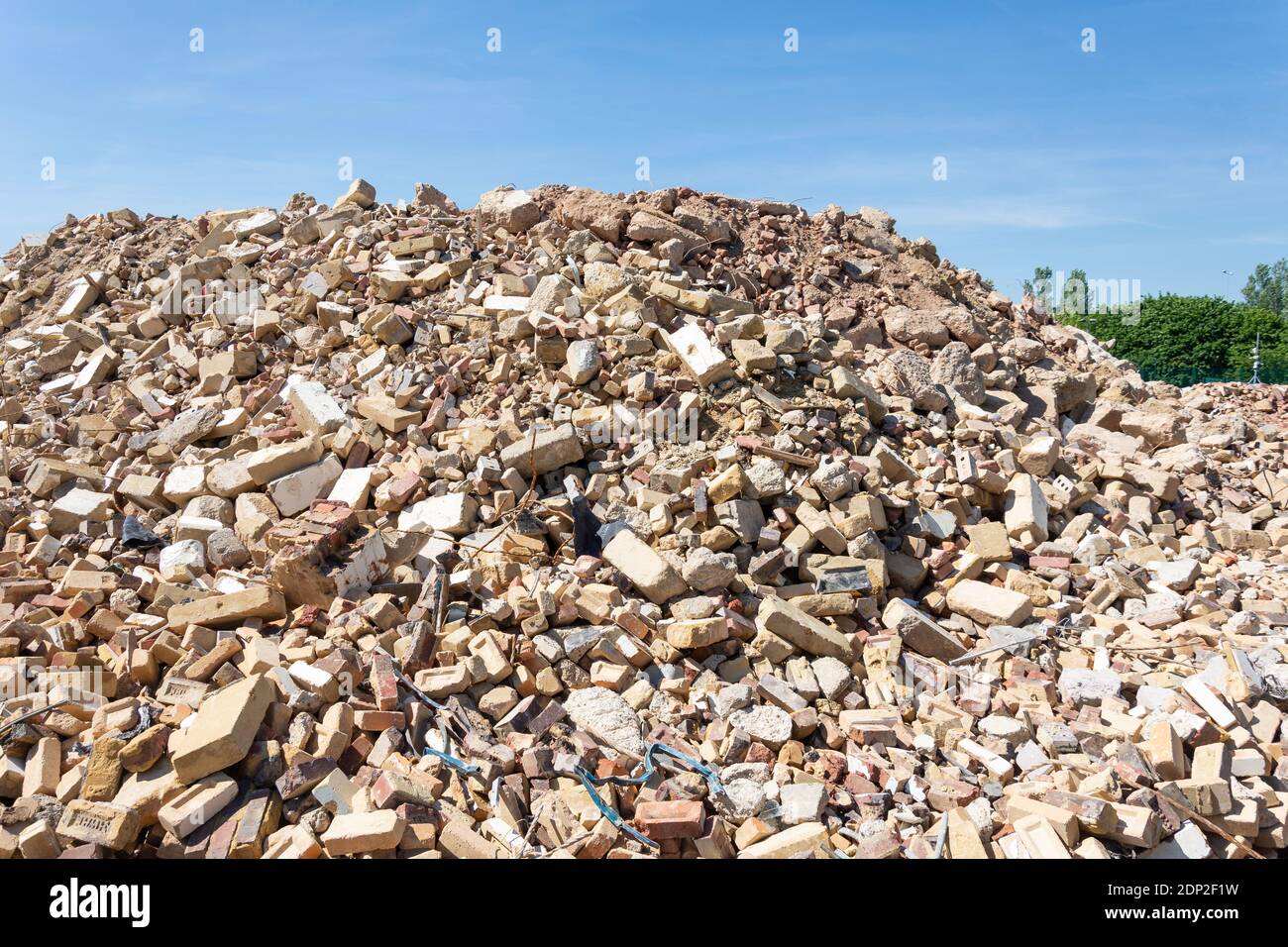 large pile of bricks, concrete and rubble at excavation building site, Egham, Surrey, England, United Kingdom Stock Photo