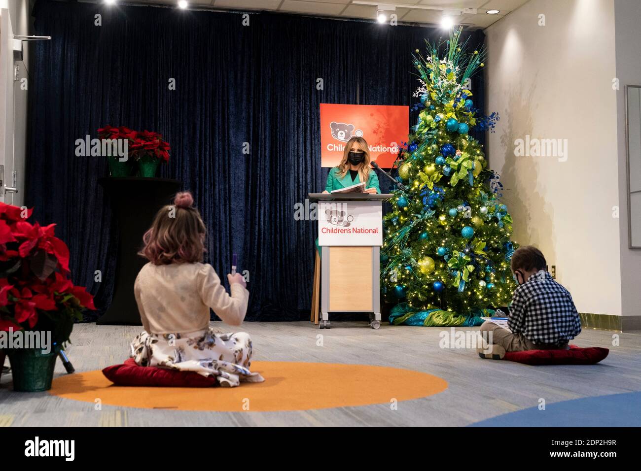 Washington, United States Of America. 15th Dec, 2020. U.S. First Lady Melania Trump hosts a game of holiday bingo with 8 year-old patient Sofia Martinez and 6 year-old patient Riley Whitney during a Christmas visit to Children's National Hospital December 15, 2020 in Washington, DC Credit: Planetpix/Alamy Live News Stock Photo