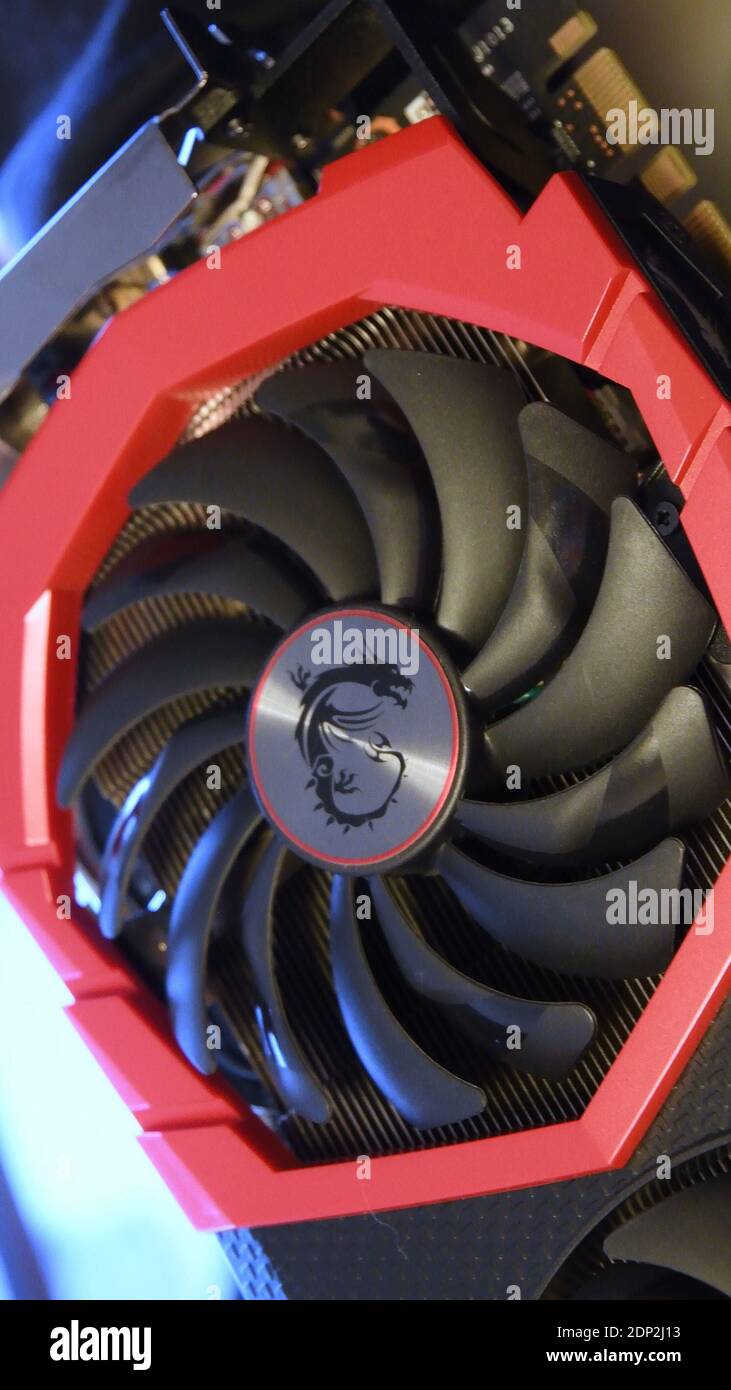 Powerful MSI GeForce GTX 1080 Gaming X 8G graphics card for e-sport gaming  PC. Finger rotate video card cooling system fan with dragon logo in center  Stock Photo - Alamy