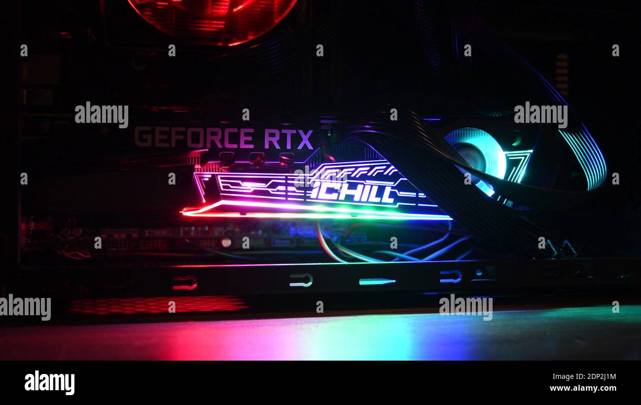 Gaming PC with NVidia GeForce RTX 3080 graphics card inside. Colorful  backligts of video card and cooling fan. Powerful hardware for computer  games. O Stock Photo - Alamy