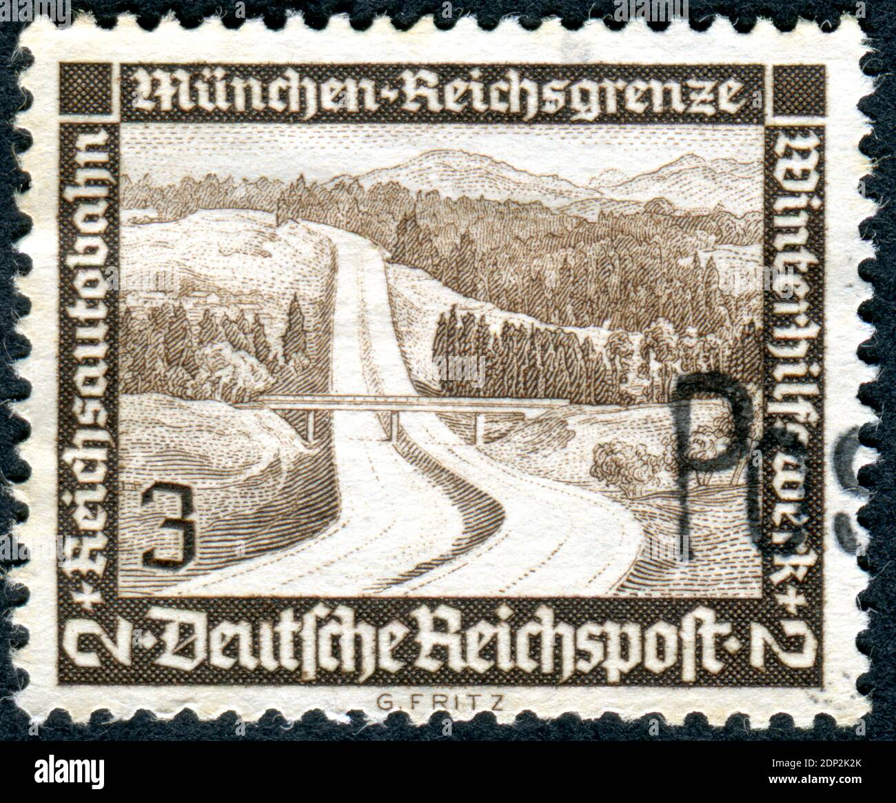 GERMANY - CIRCA 1936: Postage stamp printed in Germany, issue Winter relief, shown a motorway Munich - Austria's border, circa 1936 Stock Photo