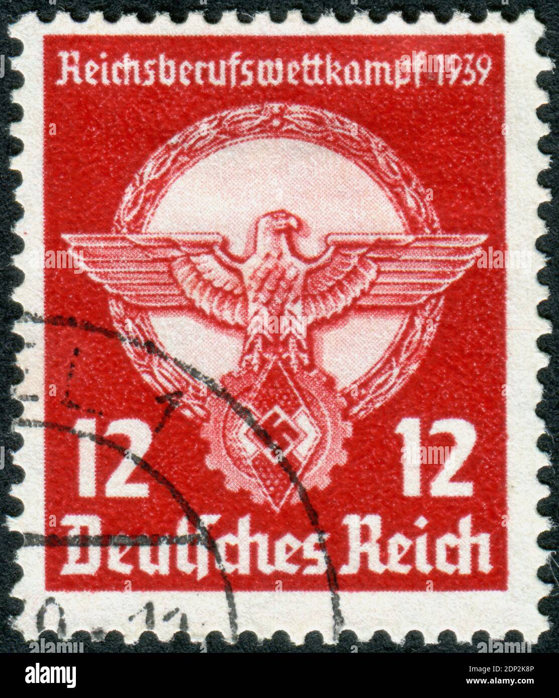 GERMANY - CIRCA 1939: Postage stamp printed in Germany, посвящен Young Workers’ Professional Competitions, shown a Nazi Emblem, circa 1939 Stock Photo