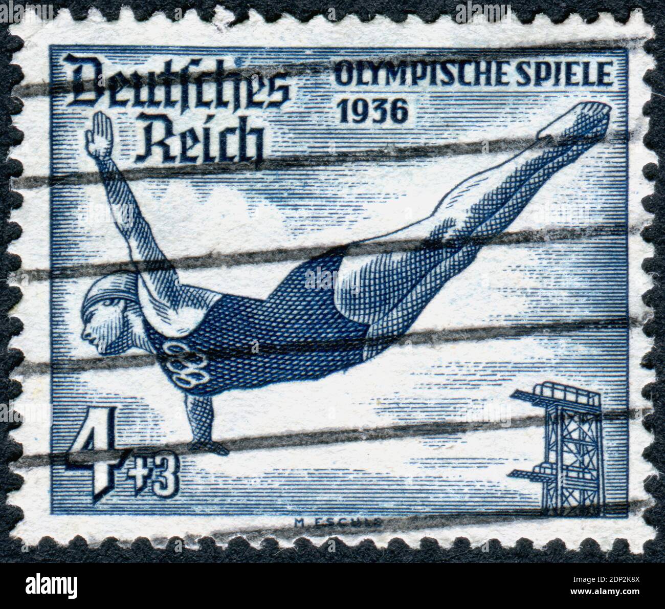 GERMANY - CIRCA 1936: Postage stamp printed in Germany, dedicated to the Summer Olympic Games in Berlin, shown a high diver, circa 1936 Stock Photo