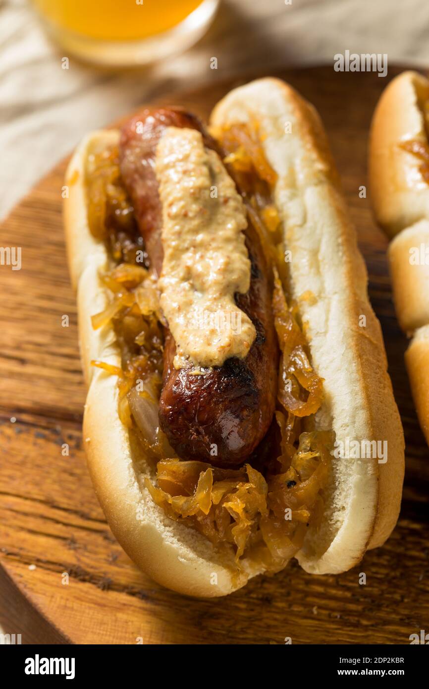Homemade Bratwurst Sausage Sandwiches with Mustard and Sauerkraut Stock