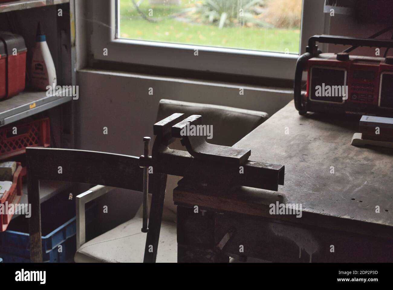 Bench vice grip clamp on table Stock Photo Alamy