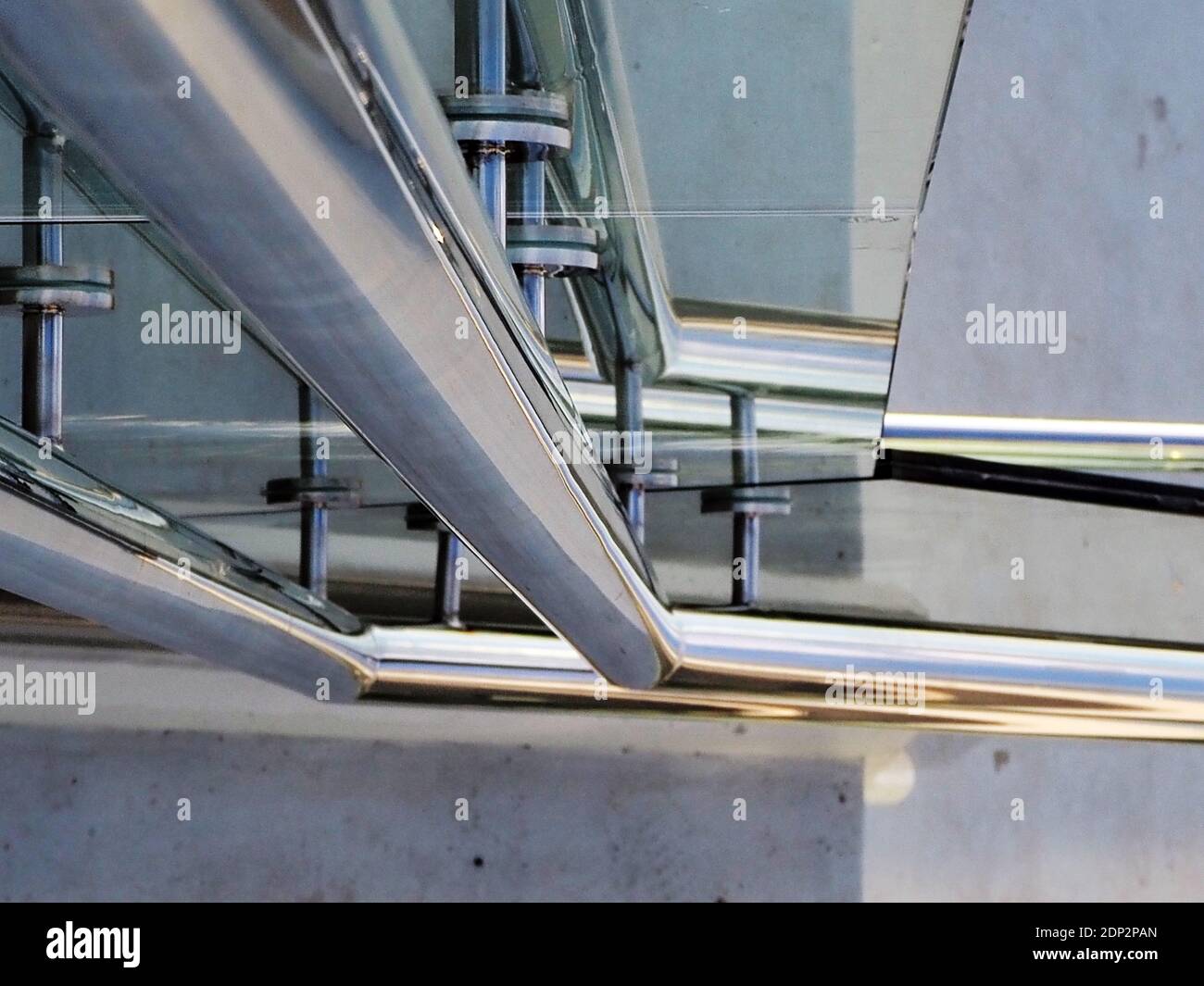 Detail of shiny metallic railings on pedestrian overpass in Athens, Greece Stock Photo