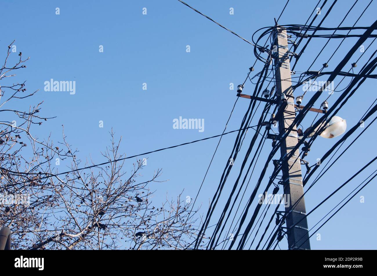 Power electricity pole and electric wire with blue sky Stock Photo - Alamy