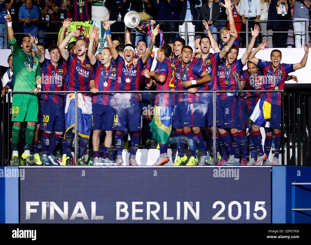 Barcelona players lift the UEFA Champions League Trophy on the Balcony  after winning the UEFA Champions