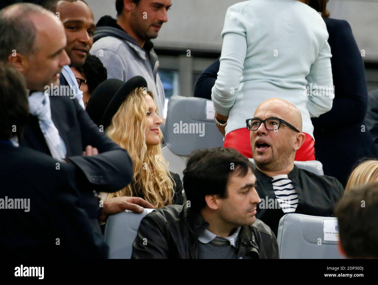 French pop singer Pascal Obispo and his girlfriend Julie Hantson during the  he French First League football match, Girondins de Bordeaux (FCGB) Vs  Montpellier HSC at the New Stadium in Bordeaux, southwestern