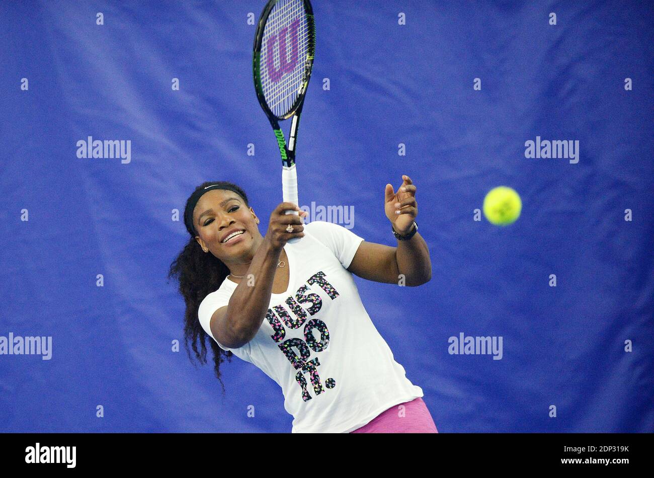 Tennis champion Serena Williams plays tennis with Donald Trump, chairman of  The Trump Organization during the grand opening of the Tennis Performance  Center at the Trump National Golf Club April 7, 2015