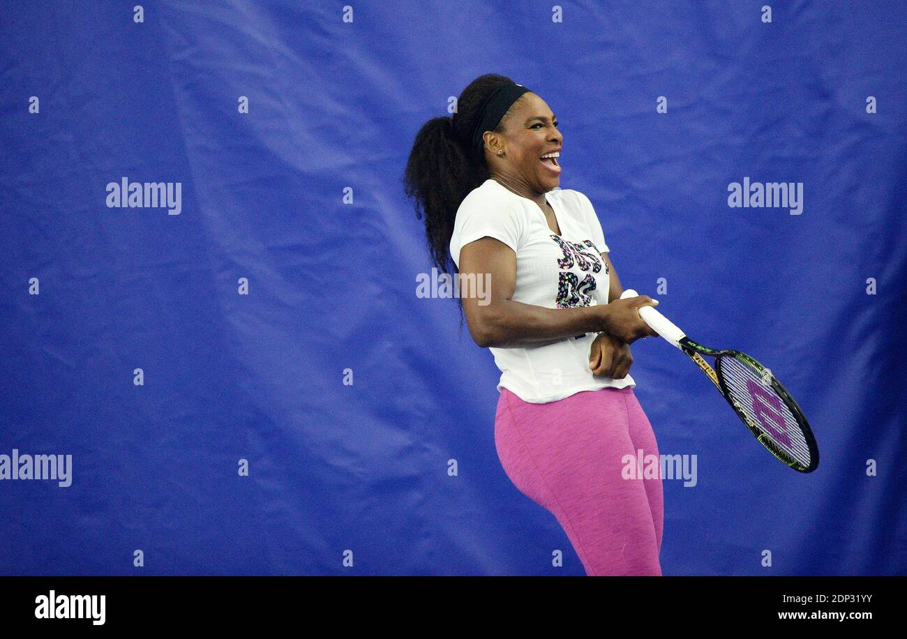 Tennis champion Serena Williams plays tennis with Donald Trump, chairman of  The Trump Organization during the grand opening of the Tennis Performance  Center at the Trump National Golf Club April 7, 2015