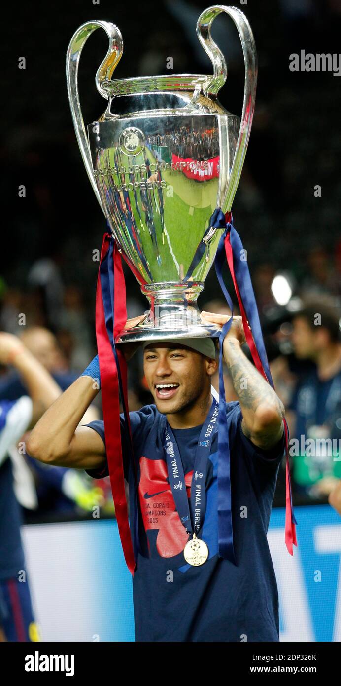 Neymar JR of FC Barcelona with the cup - UEFA Champions League Final at  Olympiastadion in Berlin, Germany, June 6, 2015. Barcelona defeated  Juventus 3-1 and won its fifth title. Photo by