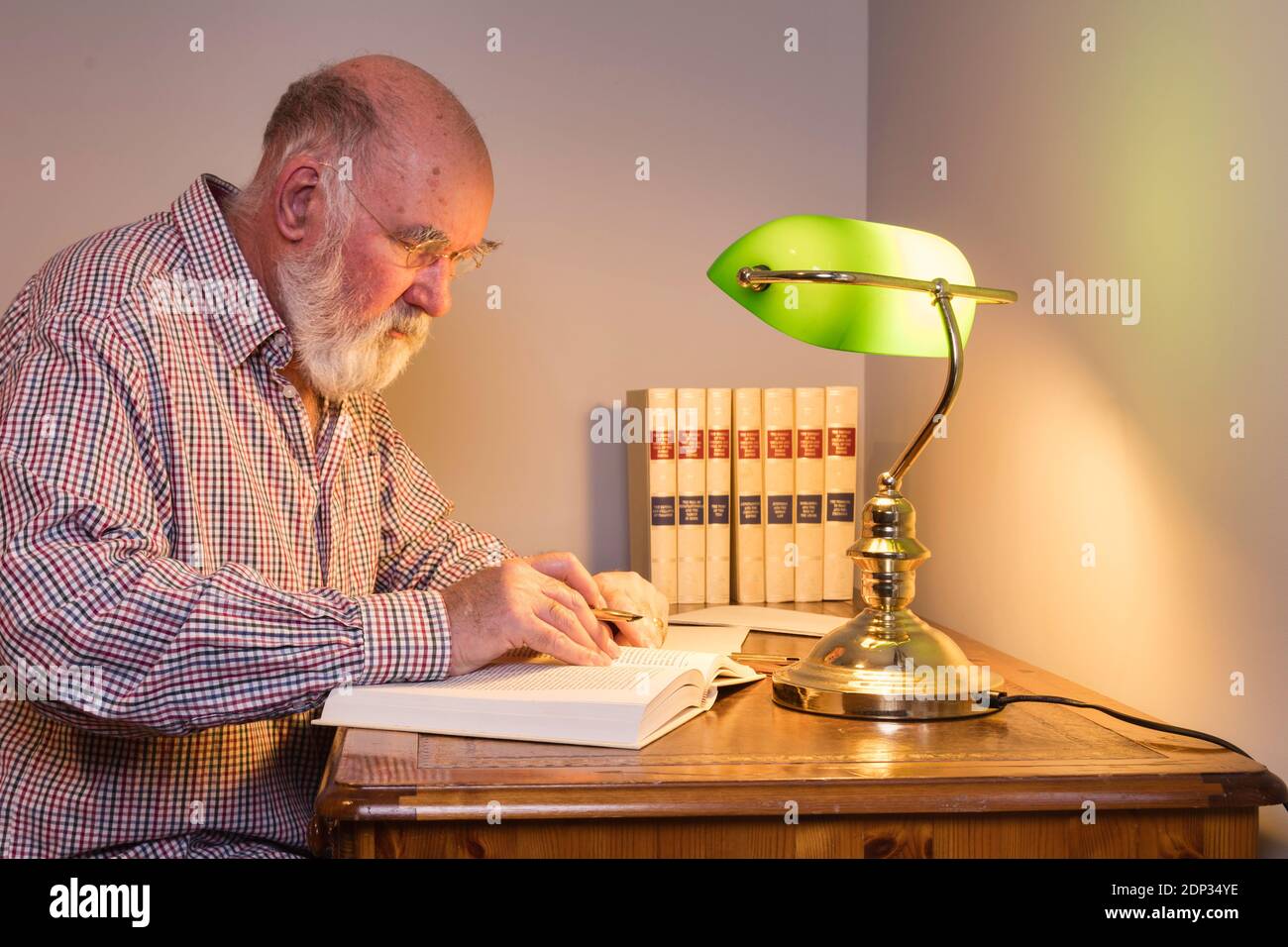 Bankers Lamp And A Stack Of Books High-Res Stock Photo - Getty Images