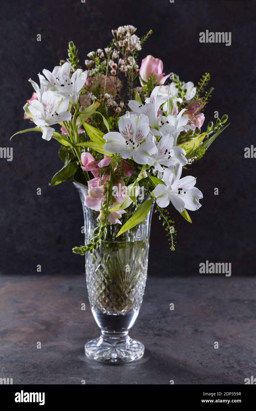 Bouquet of pink and white flowers in a cut glass vase Stock Photo - Alamy