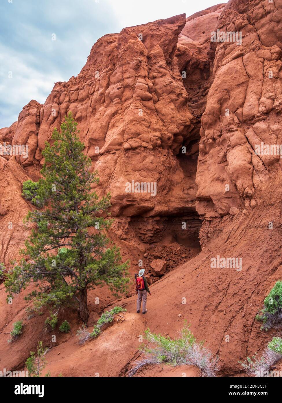 Hiker near the remains of Shakespeare [Fallen] Arch, Kodachrome Basin State Park, Cannonville, Utah. Stock Photo