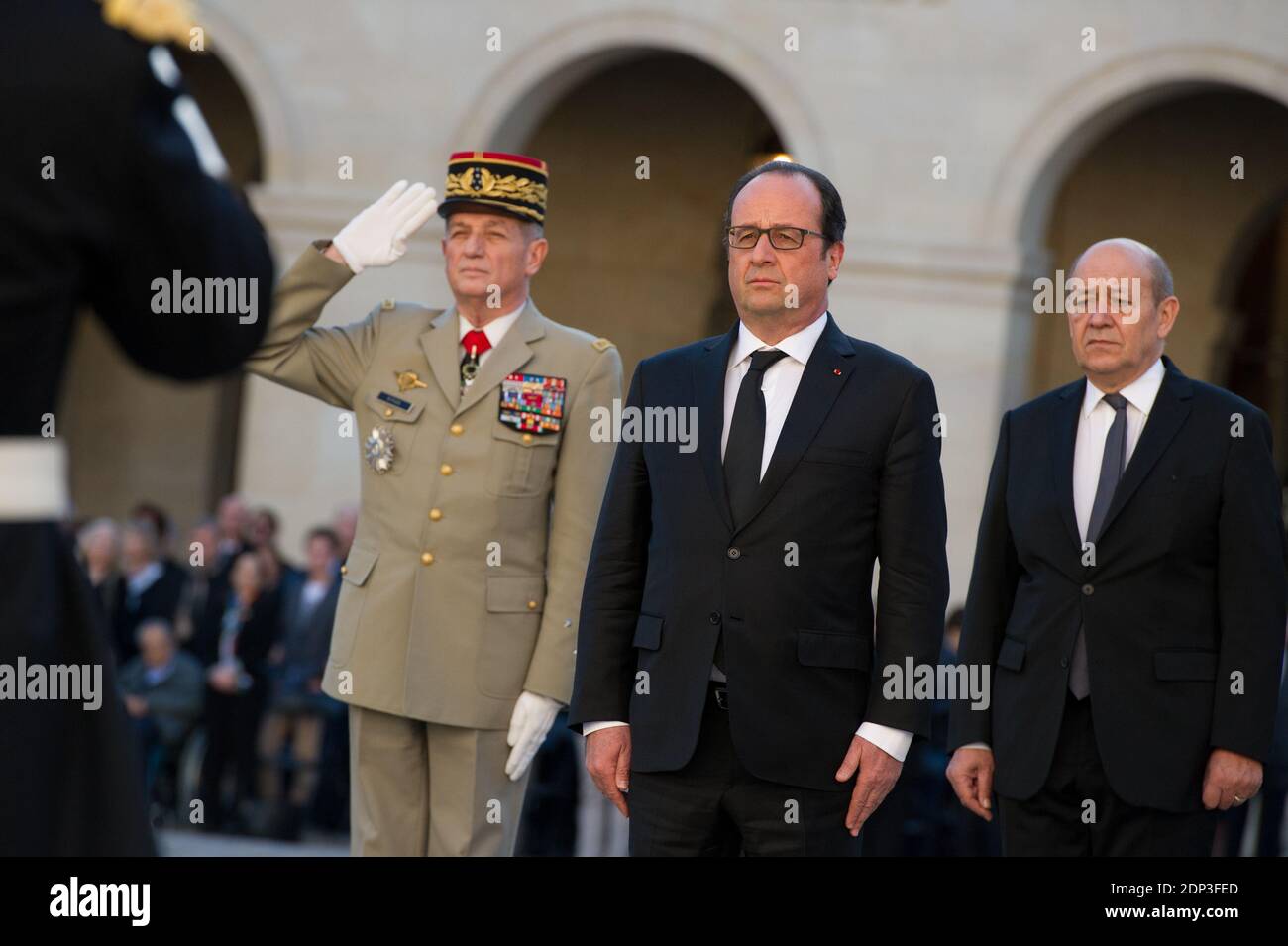 French president Francois Hollande and Defence minister Jean-Yves Le Drian attend a state funeral ceremony for late French World War II hero Jean-Louis Cremieux-Brilhac at the Hotel des Invalides in Paris, France on April 15, 2015. A towering figure in the French Resistance, Cremieux-Brilhac, one of the first to condemn the Nazi gas chambers, died on April 8, 2015 aged 98. Photo by Thierry Orban/ABACAPRESS.COM Stock Photo