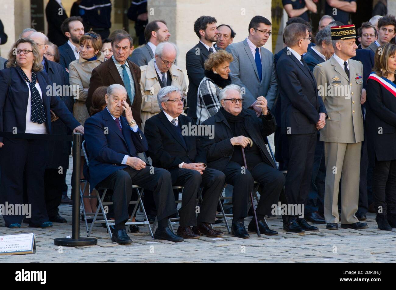 Former French Interior Minister Charles Pasqua, the leader of the Republican and Citizen Movement (MRC), Jean-Pierre Chevenement (C) and former Foreign Minister Roland Dumas attend a state funeral ceremony for late French World War II hero Jean-Louis Cremieux-Brilhac at the Hotel des Invalides in Paris, France on April 15, 2015. A towering figure in the French Resistance, Cremieux-Brilhac, one of the first to condemn the Nazi gas chambers, died on April 8, 2015 aged 98. Photo by Thierry Orban/ABACAPRESS.COM Stock Photo
