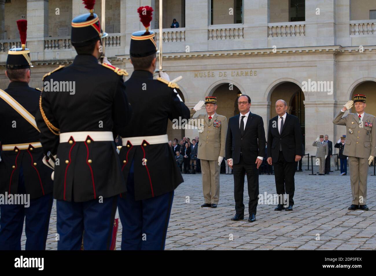 French president Francois Hollande and Defence minister Jean-Yves Le Drian attend a state funeral ceremony for late French World War II hero Jean-Louis Cremieux-Brilhac at the Hotel des Invalides in Paris, France on April 15, 2015. A towering figure in the French Resistance, Cremieux-Brilhac, one of the first to condemn the Nazi gas chambers, died on April 8, 2015 aged 98. Photo by Thierry Orban/ABACAPRESS.COM Stock Photo