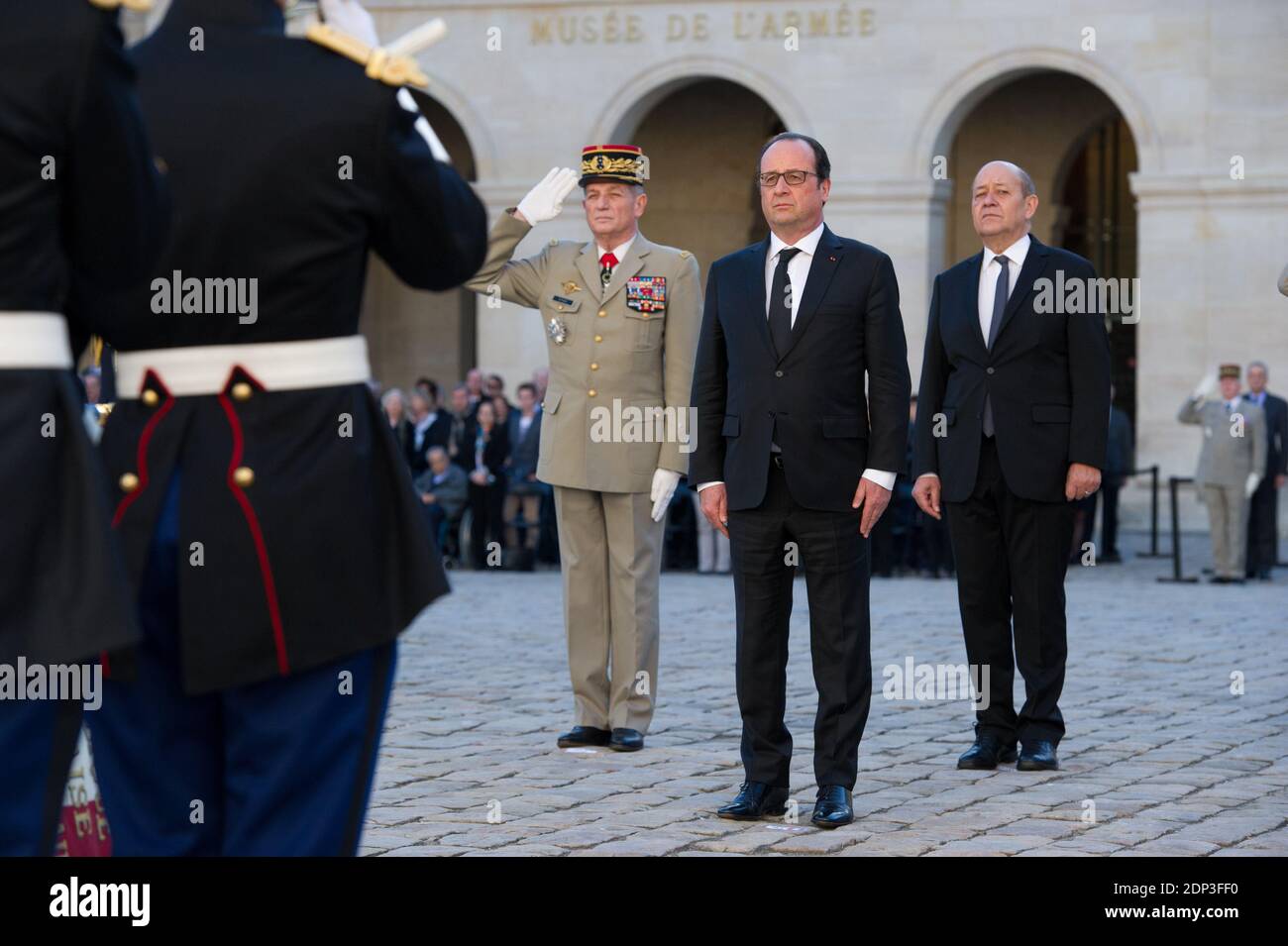 French president Francois Hollande and Defence minister Jean-Yves Le Drian attend a state funeral ceremony for late French World War II hero Jean-Louis Cremieux-Brilhac at the Hotel des Invalides in Paris, France on April 15, 2015. A towering figure in the French Resistance, Cremieux-Brilhac, one of the first to condemn the Nazi gas chambers, died on April 8, 2015 aged 98. Photo by Thierry Orban/ABACAPRESS.COM Stock Photo