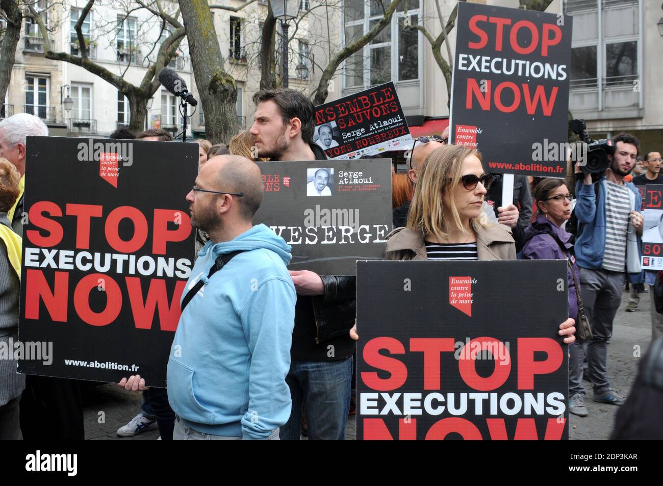 Protesters Hold Amnesty International Placards Reading 10 People At Risk Of Execution In Indonesia No To Death Penalty And Indonesia Stop Death Penalty On April 25 2015 In Paris France During