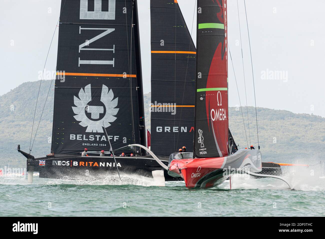 Emirates Team New Zealand over takes INEOS Team UK after handing them a 40 second head start in the pre start. Race eight of the regatta. PRADA America's Cup World Series Auckland Race Day Two. 18/12/2020 Stock Photo