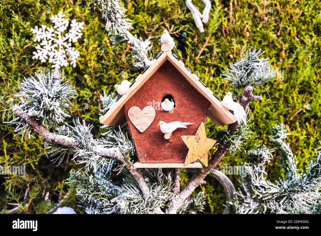 Outdoor Christmas decoration, fake bird house Stock Photo Alamy