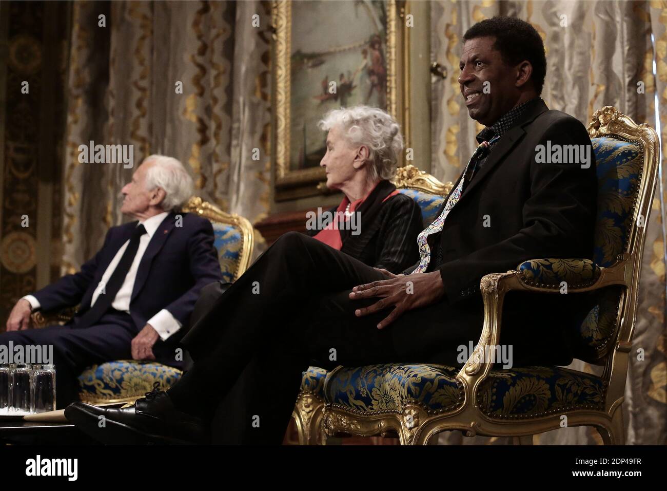 Haitian Canadian writer Dany Laferriere receives his academician sword from  French novelist of French Academy member