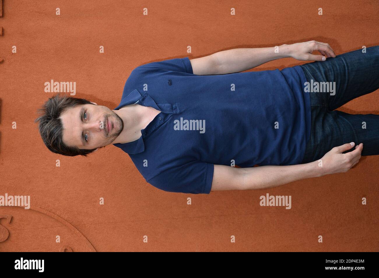 Raphael Personnaz posing at the Village during French Tennis Open at