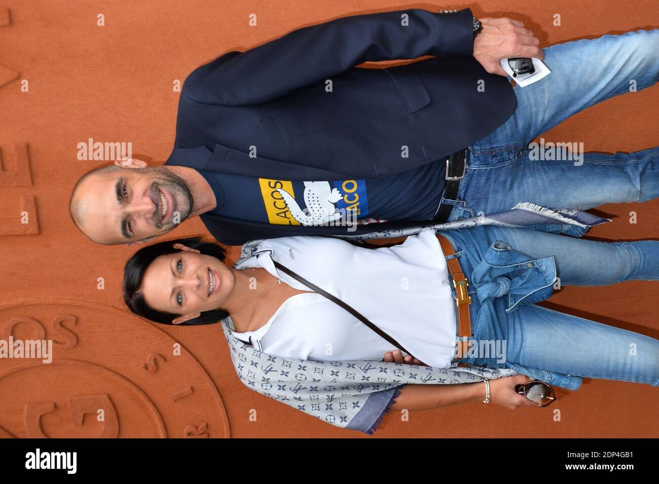 Jerome Alonzo and girlfriend posing at the Village during French Tennis Open at Roland Garros arena in Paris, France on June 3rd, 2015. Photo by Nicolas Briquet/ABACAPRESS.COM Stock Photo