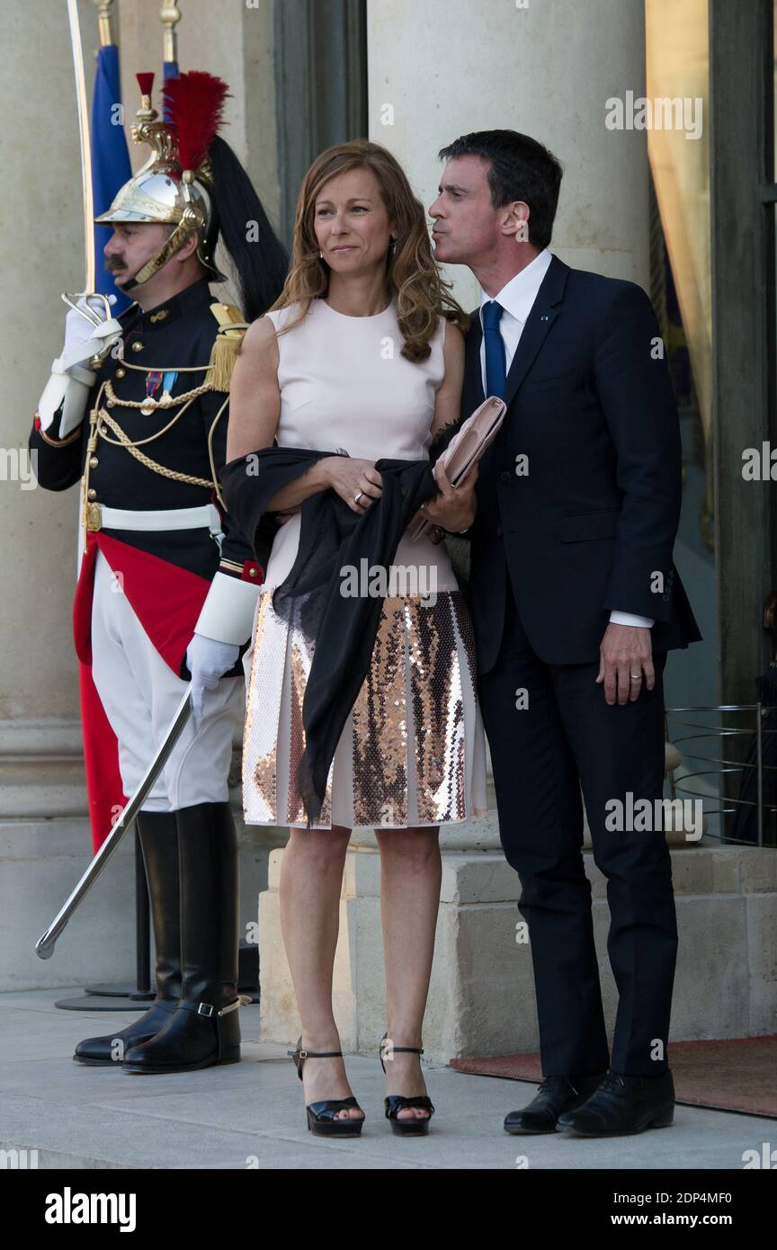 French Prime Minister Manuel Valls and his wife Anne Gravoin arriving for an official dinner in honor of Chilean President Michele Bachelet at the Elysee Palace in Paris, France on June 8, 2015. Photo by Thierry Orban/ABACAPRESS.COM Stock Photo