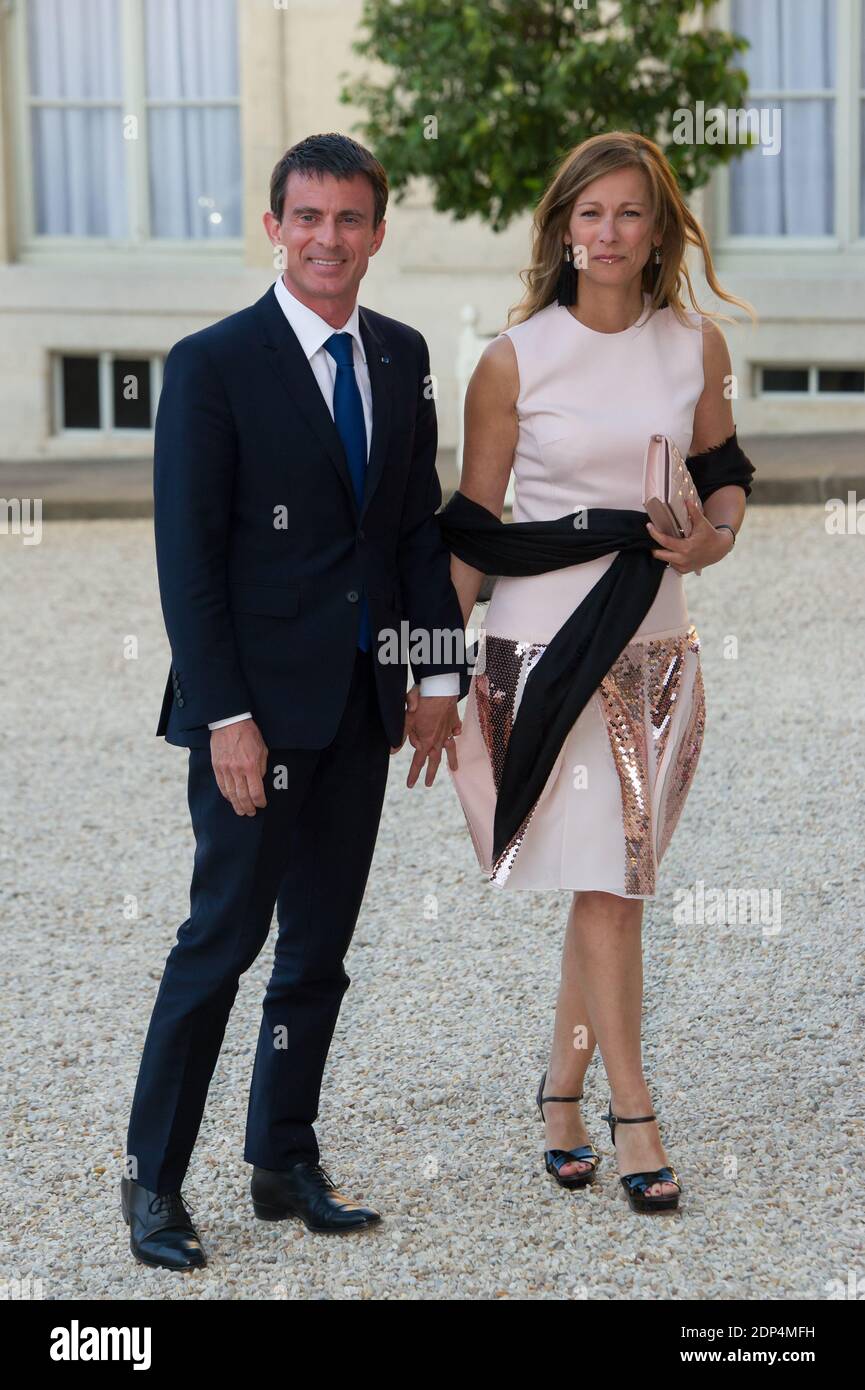 French Prime Minister Manuel Valls and his wife Anne Gravoin arriving for an official dinner in honor of Chilean President Michele Bachelet at the Elysee Palace in Paris, France on June 8, 2015. Photo by Thierry Orban/ABACAPRESS.COM Stock Photo