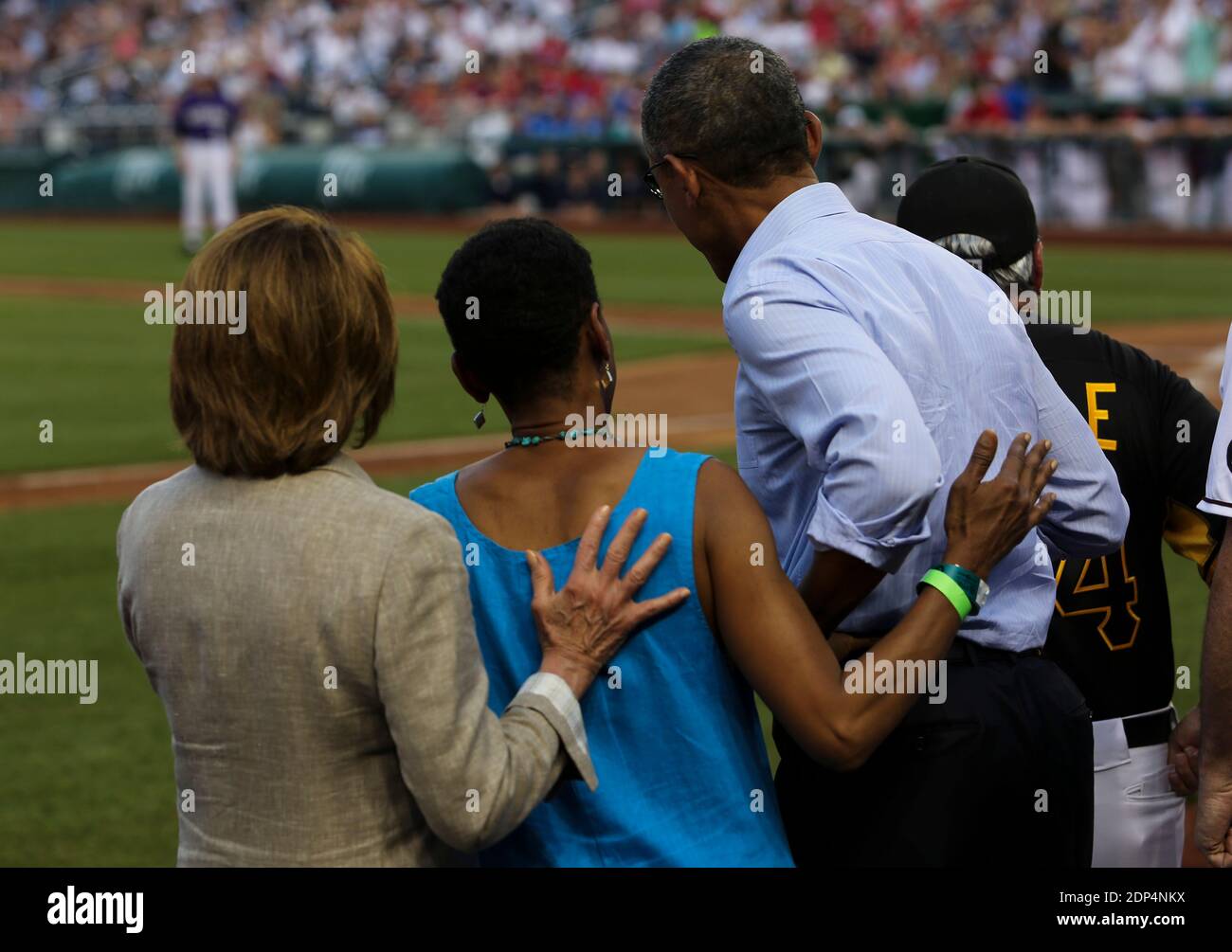 US President Barack Obama (R) with Congresswoman Donna Edwards D-MD (C) and Minority Leader Nancy Pelosi (L) watch the 2015 Congressional Baseball Game at the Nationals Park Stadium, in Washington, DC, USA, on June 11, 2015. Photo by Aude Guerrucci/Pool/ABACAPRESS.COM Stock Photo