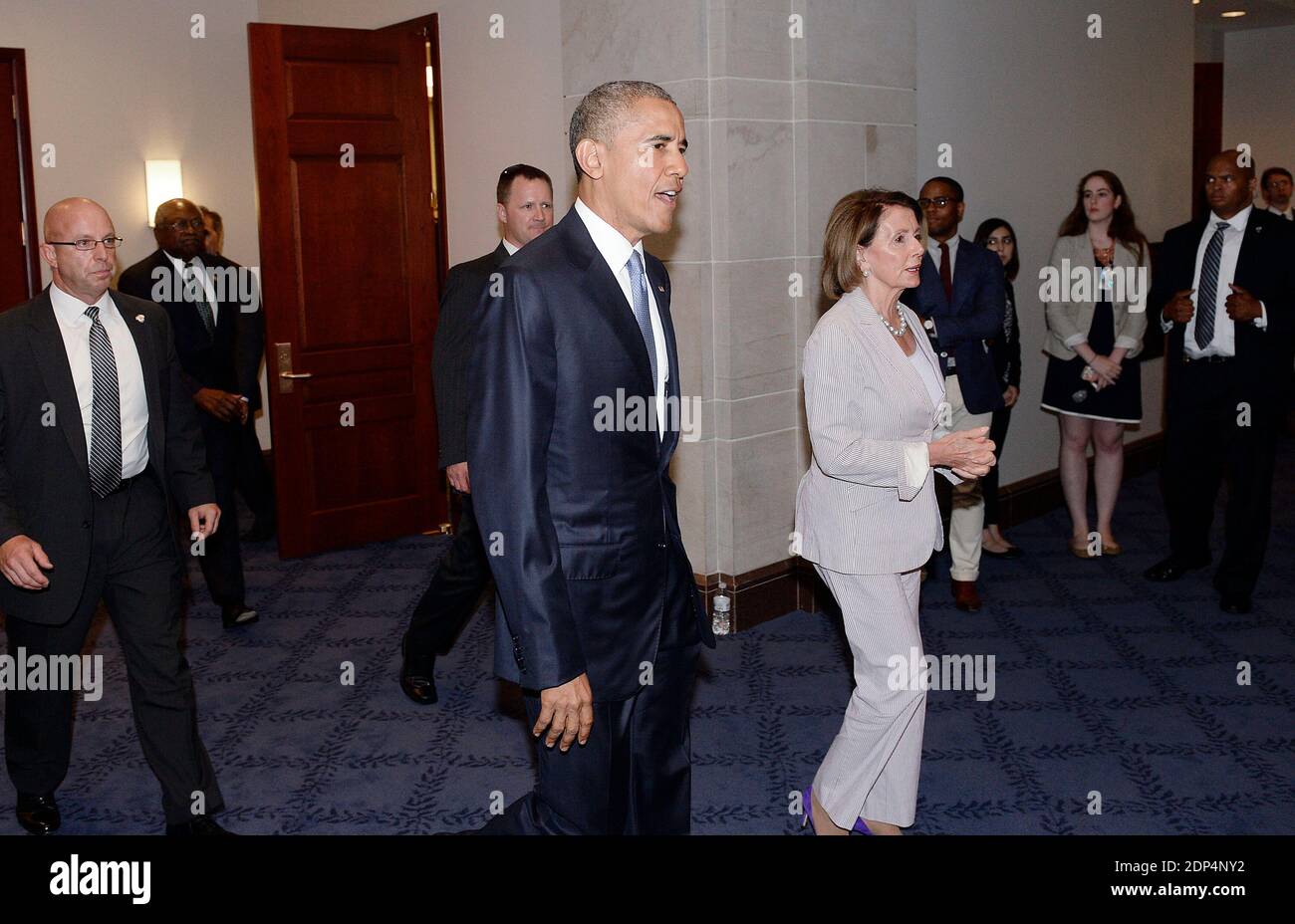 President Barack Obama and House Minority Leader Nancy Pelosi leave the Gabriel Zimmerman room aftera meeting with members of the House Democratic caucus to discuss his trade agenda on Capitol Hill June 12, 2015 in Washington, D.C. Photo by Olivier Douliery/ABACAPRESS.COM Stock Photo