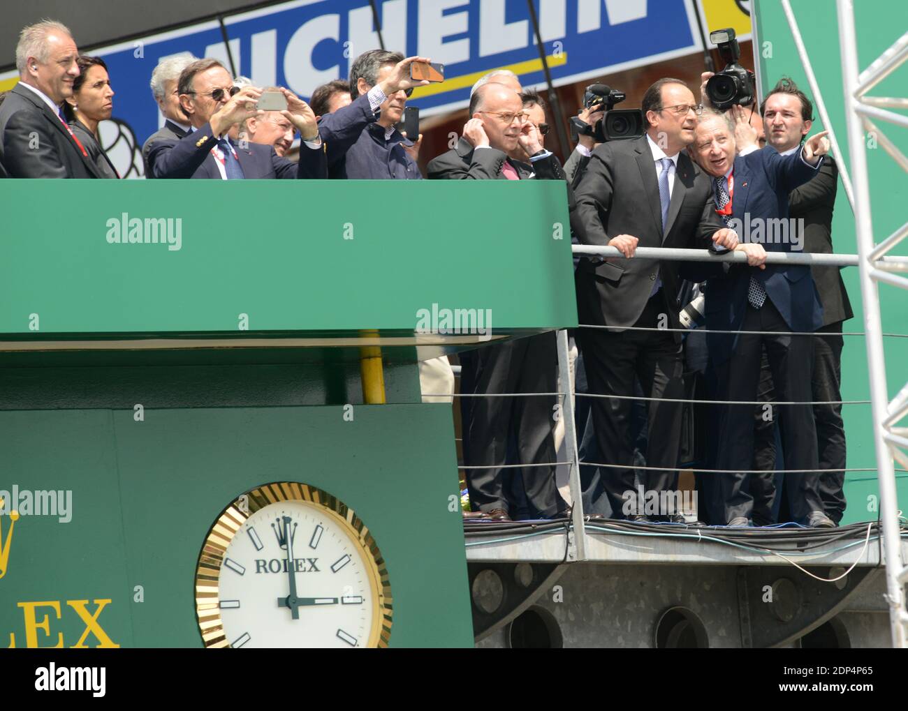 French President Francois Hollande with Pierre Fillon , France's President of the Automobile Club de l’Ouest (ACO), in charge of the organisation of the Le Mans 24-hours endurance race and France's FIA President Jean Todt watching the start of the Le Mans 24-hours endurance race in Le Mans, western France, on June 13, 2015. Photo by Guy Durand/ABACAPRESS.COM Stock Photo