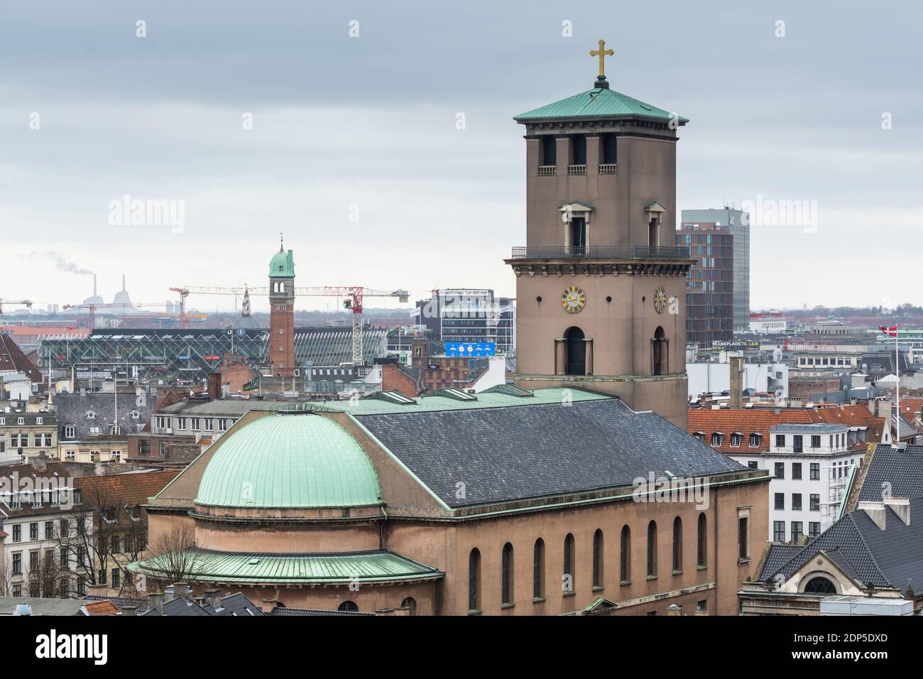 Church of Our Lady (Vor Frue Kirke), Aerial view of downtown of Copenhagen City from the The Round Tower (Rundetaarn) in rainy misty day with cloudy s Stock Photo
