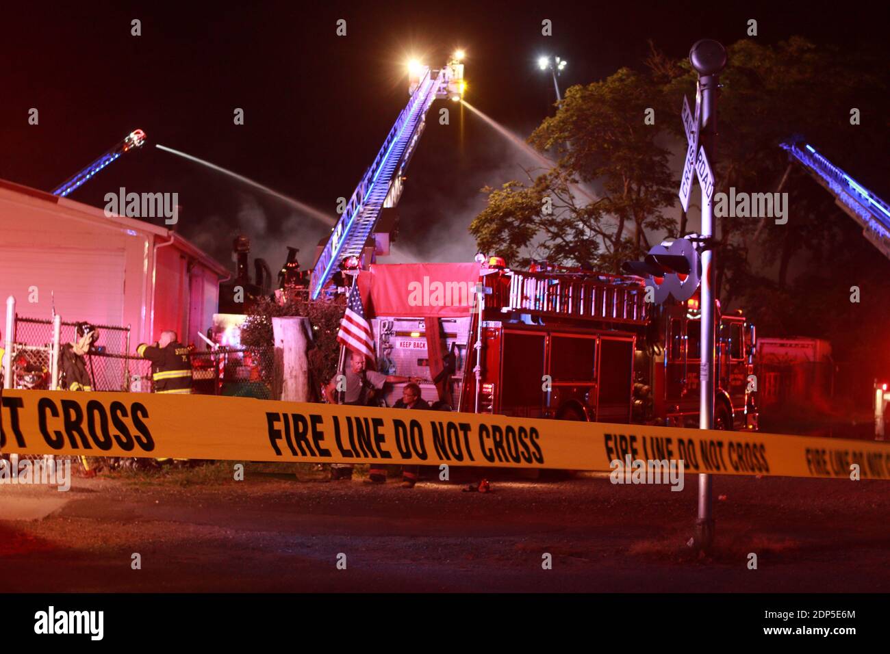 Police and fireline tape to keep people out of a scene or danger. Stock Photo