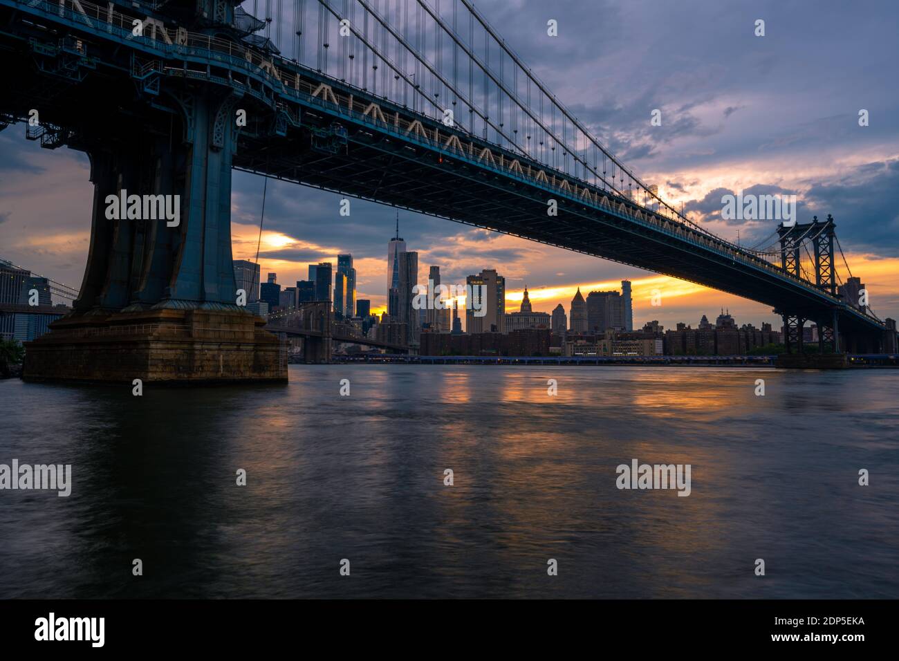 View on Lower Manhattan, Brooklyn Bridge and Manhattan Bridge from the DUMBO Brooklyn, NY Stock Photo