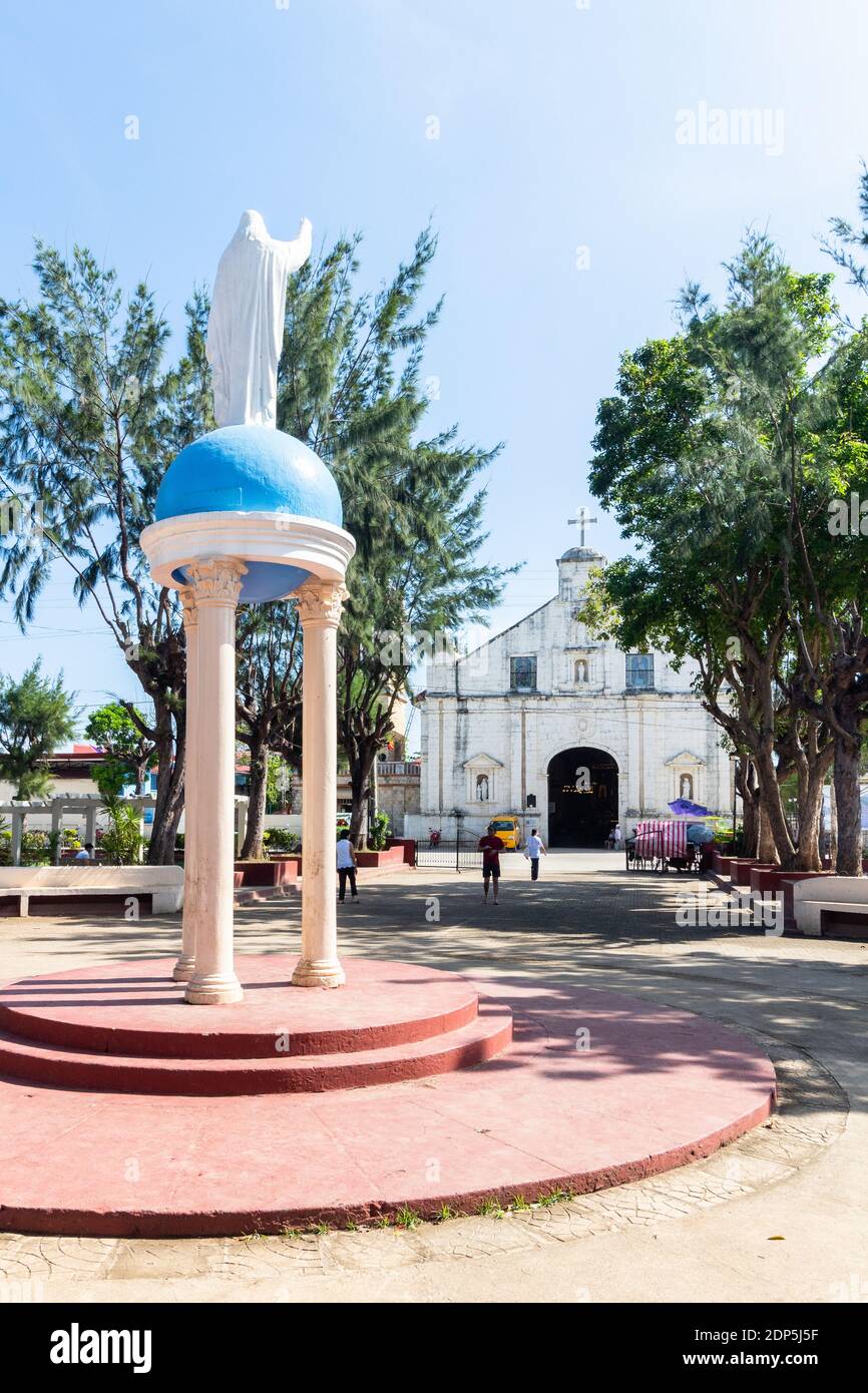 The Bantayan plaza with the centuries old church in the background in Cebu, Philippines Stock Photo