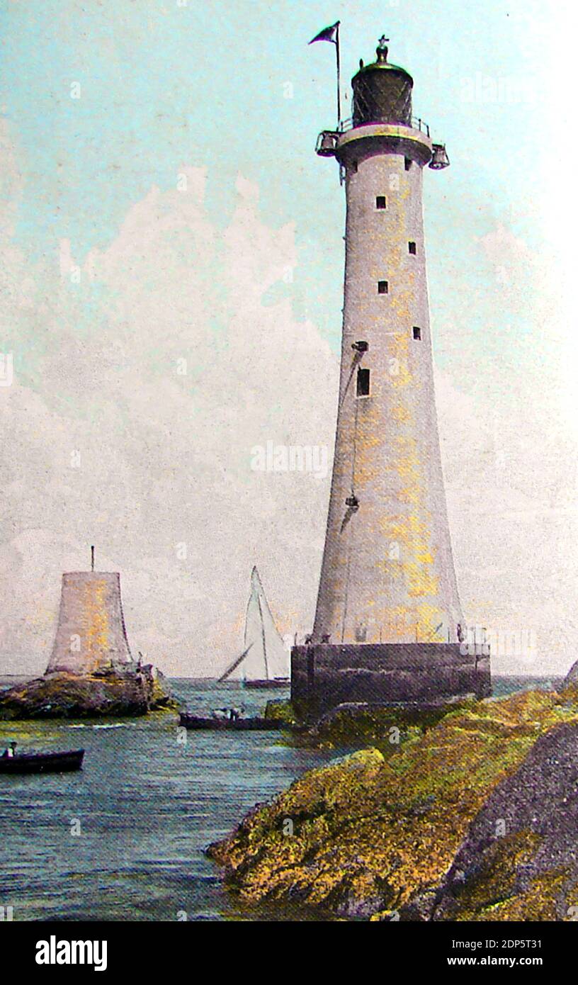 A boat delivering provisions to the keeper of the Eddystone Lighthouse (UK) in the 1920's Stock Photo