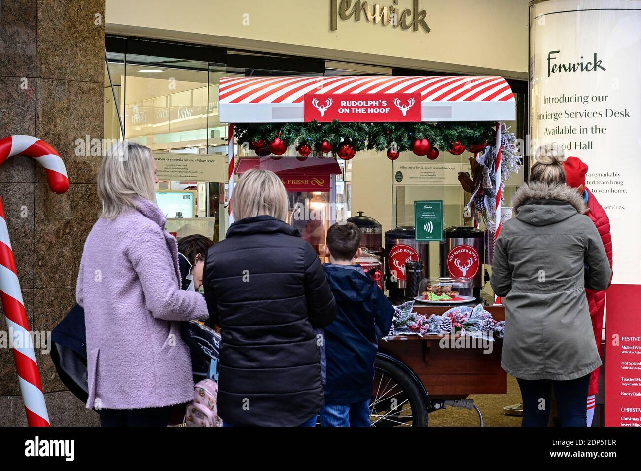 Shoppers stop at Rudolph's on the Hoof outside of Fenwicks on Northumberland Street in Newcastle upon Tyne for festive treats on Black Friday Stock Photo