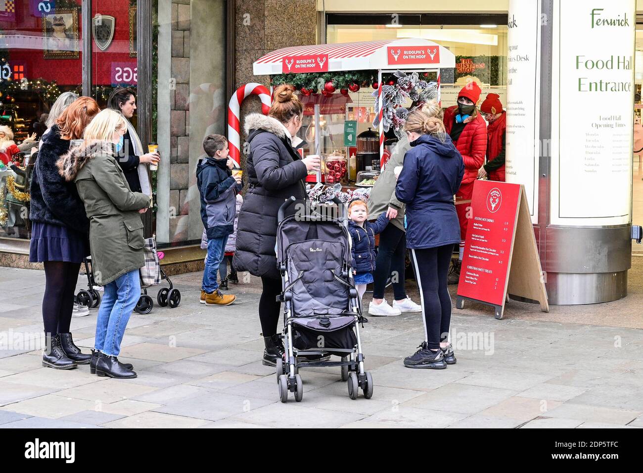 Shoppers stop at Rudolph's on the Hoof outside of Fenwicks on Northumberland Street in Newcastle upon Tyne for festive treats on Black Friday Stock Photo