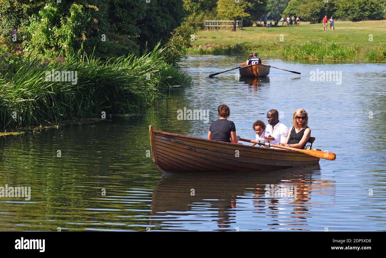 Rowers on the river Stour near Dedham in Essex. Stock Photo