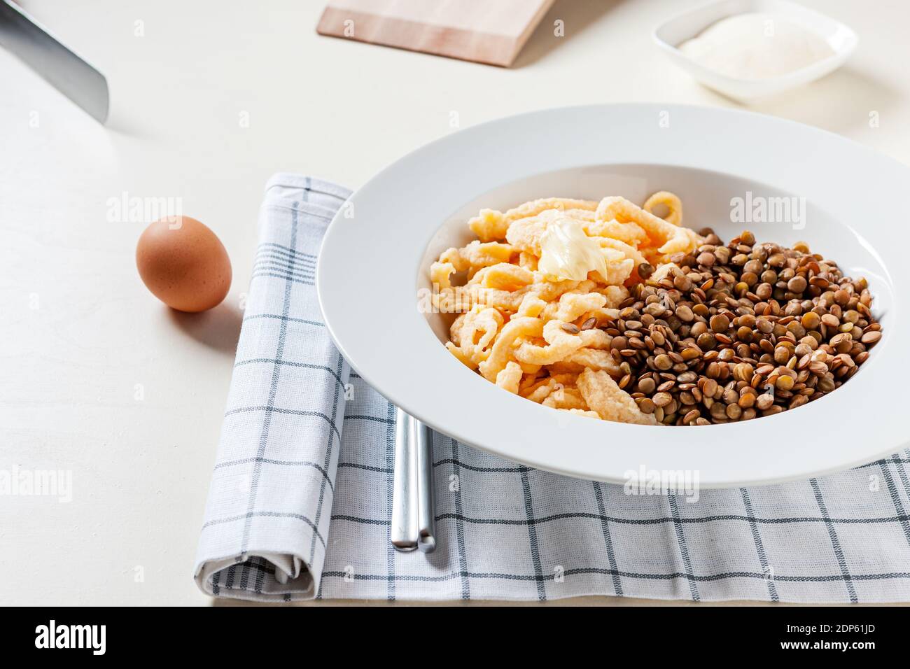 homemade 'spaetzle' noodles and lentils Stock Photo