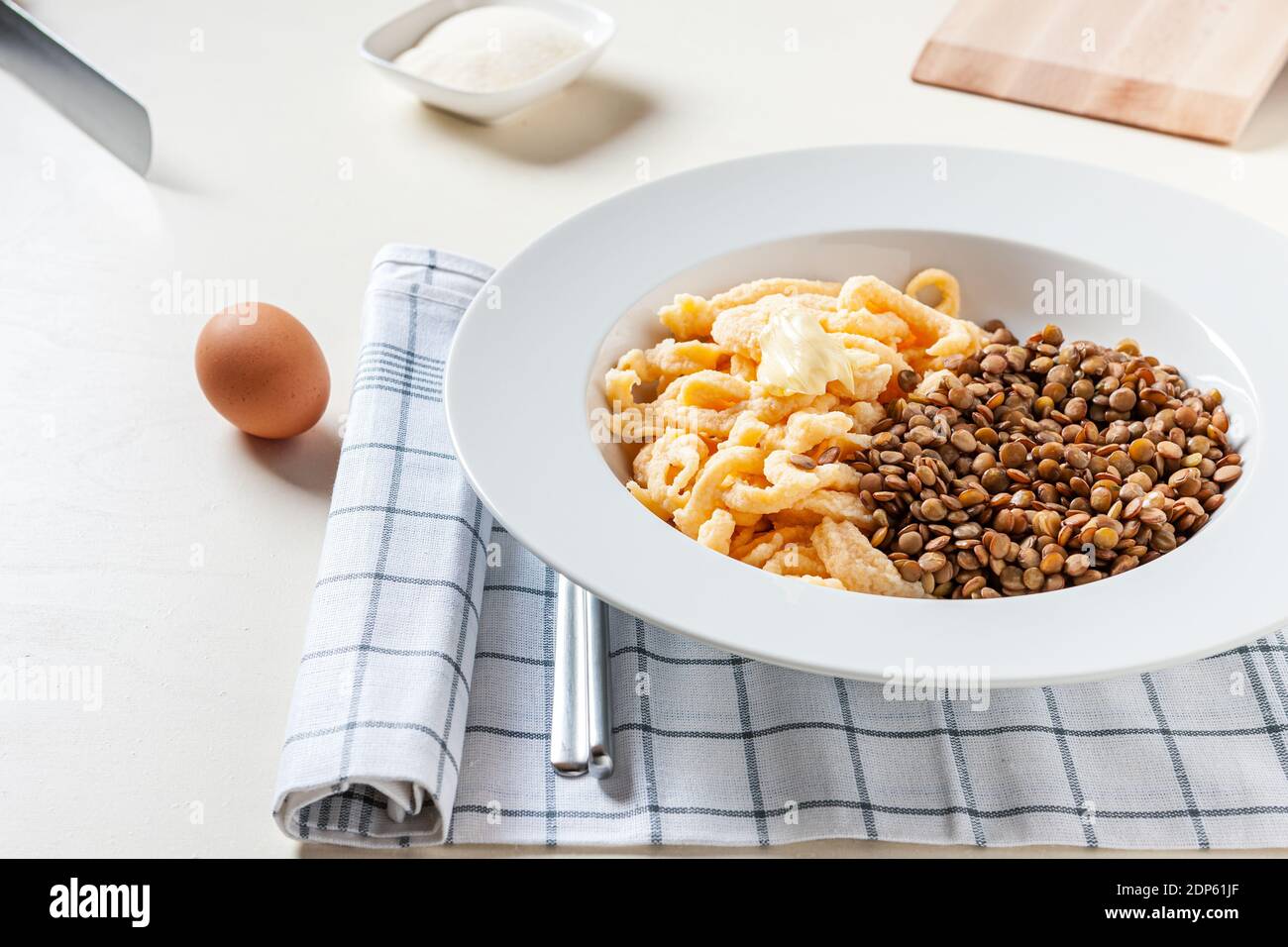 homemade 'spaetzle' noodles and lentils Stock Photo